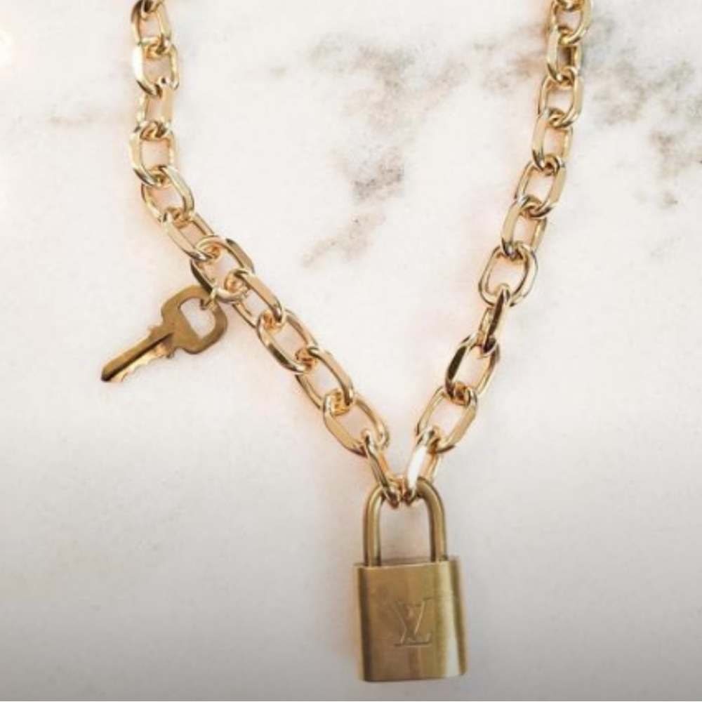 Louis Vuitton authentic lock and key on chain